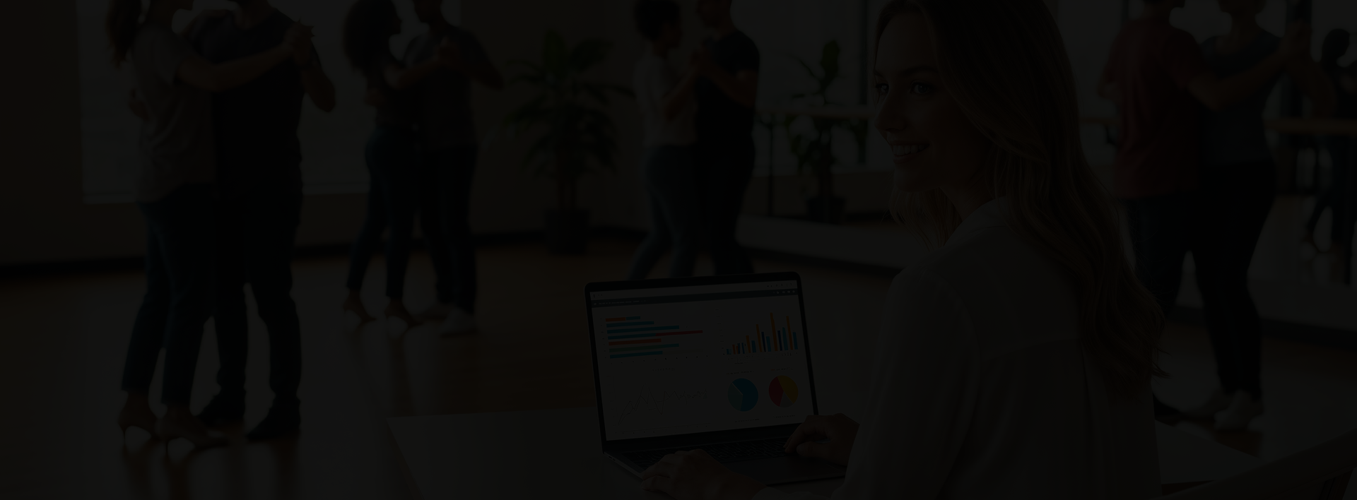 People practicing together at a group dance session with analytics dashboard