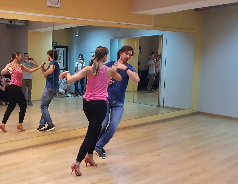 People dancing in a dance studio